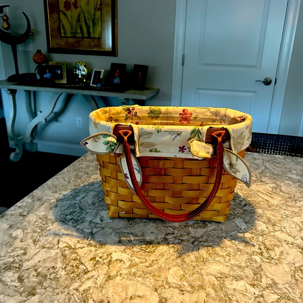 Longaberger Tote Leather Handles complete with floral liner and plastic insert.